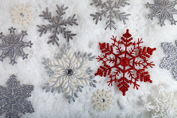 Snowflakes in the snow. Christmas background. - Valokuva, kuva