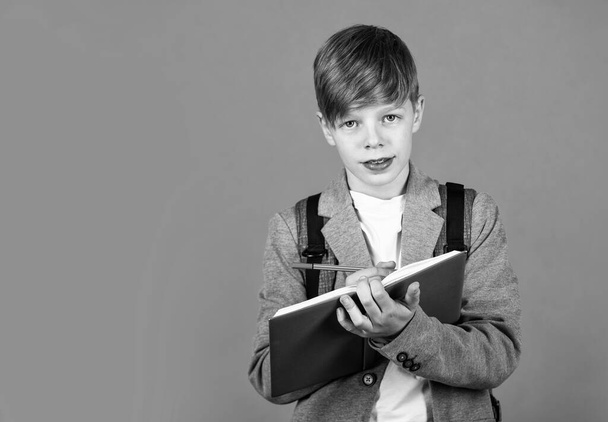 Homework. Writing notes. Nerd lifestyle. Boy studying. Basic education. Skills and knowledge. Student with book. Learning foreign language. Education for kids. Child care. School education concept - Photo, image