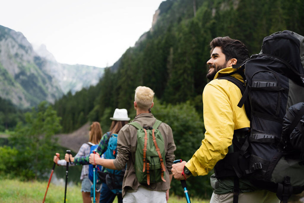 Hiking friends travel outdoor sport lifestyle concept - Foto, afbeelding