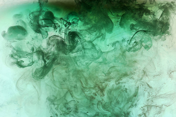 Abstract blue-green ocean, paint in water background. swirl of splashes and waves in motion. Fluid art wallpaper, liquid vibrant colors - Fotografie, Obrázek