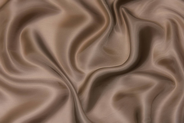 Textura close-up de tecido bege natural ou pano na cor marrom. Textura de tecido de algodão natural ou material têxtil de linho. fundo de lona bege. - Foto, Imagem
