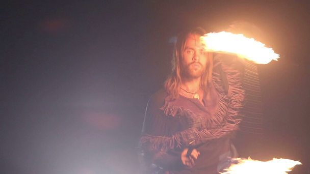 Bearded man in fire performance - Filmati, video