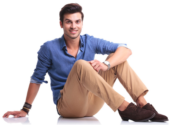 happy young casual man laying down - Photo, Image