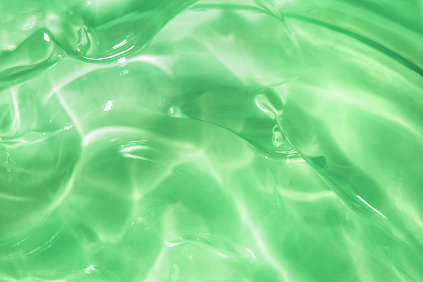 Green water Aloe Vera gel smudged texture - Photo, Image