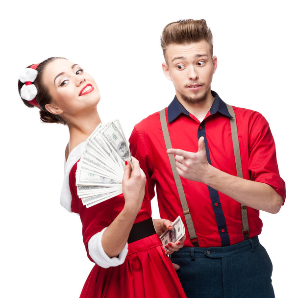 Joven pareja retro sosteniendo dinero
 - Foto, imagen