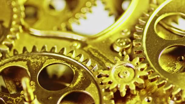Golden Vintage Antique Gears Mechanism Working Zoom Out Close Up - Záběry, video