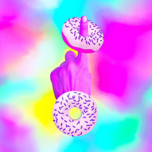 Contemporary minimal art collage. Hand and donuts in fantasy space. Calories, diet, sweet, unhealthy food concept - Photo, image
