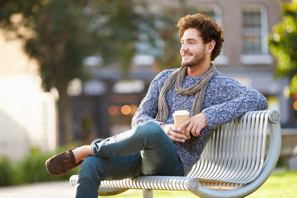 Man Relaxing On Park Bench - Photo, image