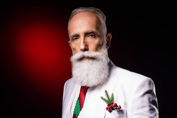 Photo of mature serious man well groomed new year time december party holiday isolated over dark color background - Fotografie, Obrázek