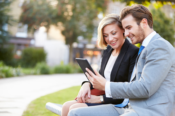 Business Couple Using Digital Tablet - Foto, Imagen