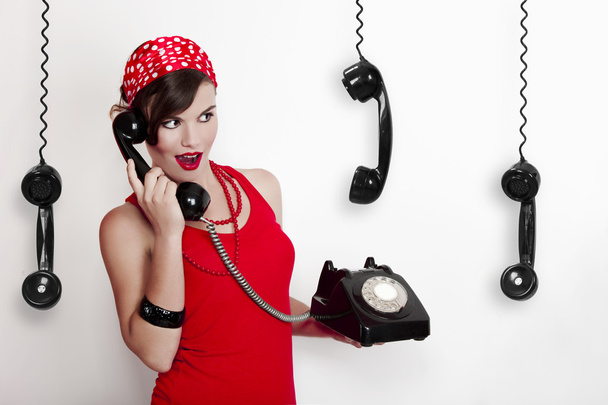 Girl with a vintage phone - Foto, imagen