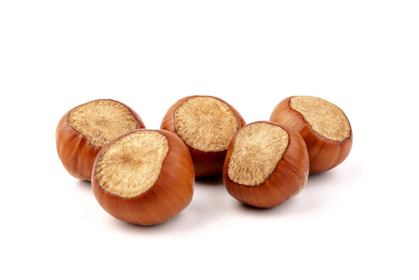 Hazel nuts on a white background. Hazelnut background, healthy food - Photo, Image