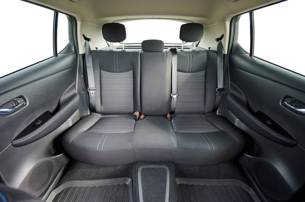 Серого цвета текстильный автомобиль заднее сиденье изолированы на фоне студии - Фото, изображение