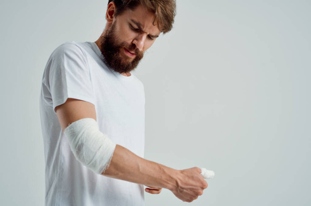 male patient hand injury treatment health problems emotions light background - Fotografie, Obrázek