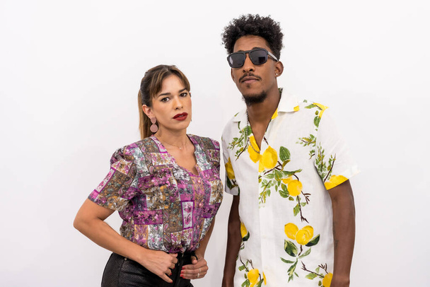 Couple of a black boy and Caucasian girl on a white background - Fotó, kép