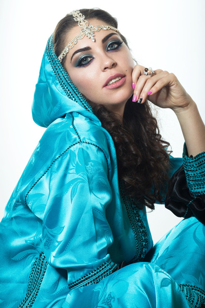 Beautiful girl in the Arab image with bright oriental make-up. - Valokuva, kuva