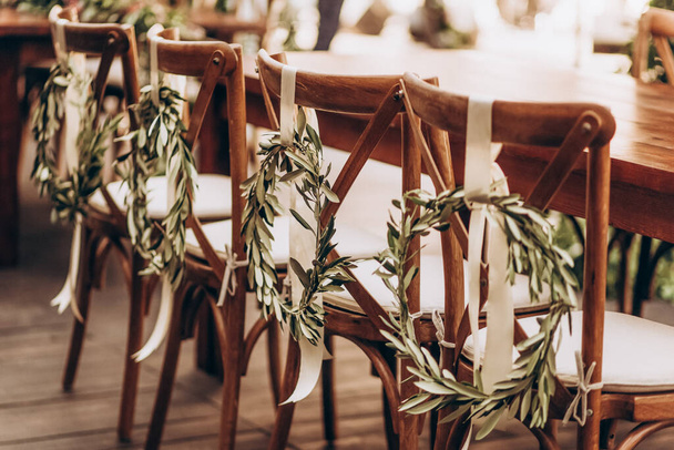 Boho wedding chair with eco decor for guests. - Zdjęcie, obraz