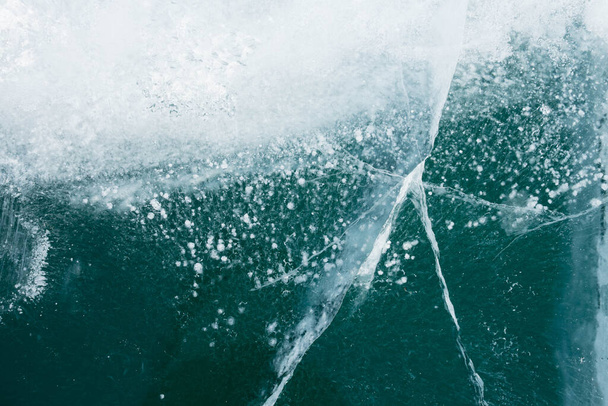 clear ice on a frozen lake - Fotó, kép