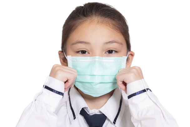 Girl in a medical mask.Isolated on white background. - Φωτογραφία, εικόνα