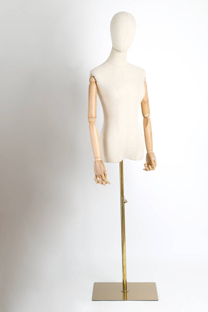 The fablic mannequin standing on the white background. - Photo, Image
