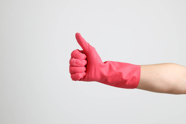 The pink gloves on the white background. - Photo, Image