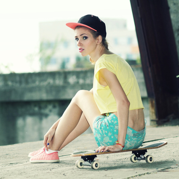 Woman with skateboard - Photo, Image