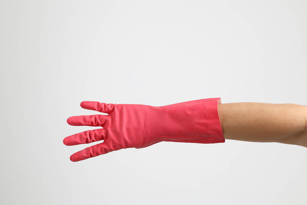 The pink gloves on the white background. - Foto, Bild