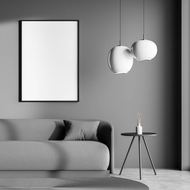 Dark living room interior with white empty poster, sofa, coffee table and concrete floor. Concept of minimalist design for chill and relaxation. Mock up. 3d rendering - Fotó, kép