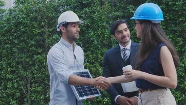 Engineer team talking with executive and deal about electric solar cell panel, architect discussion and doing agreement together with handshake for success, power and innovation, industry concept. - Footage, Video