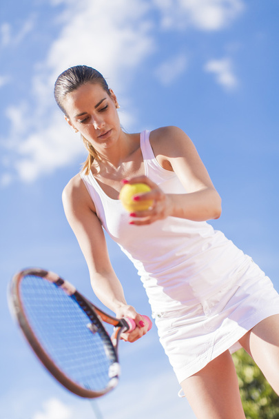 Donna che gioca a tennis
 - Foto, immagini