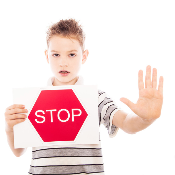 Happy boy with stop sign - Zdjęcie, obraz