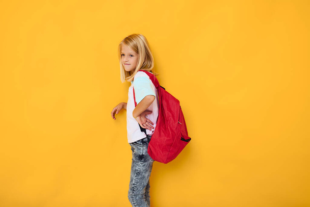 happy schoolgirl stylish clothes red backpack studio lifestyle - Foto, imagen