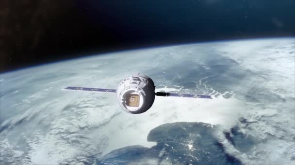Buque de suministro Preparándose para atracar con la estación espacial sobre la superficie de la Tierra - Metraje, vídeo