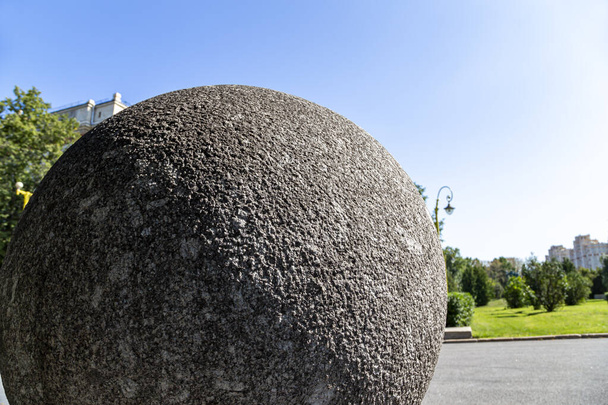 Large granite ball on the territory of Moscow State University (MSU) on Sparrow Hills (summer day).Russia  - Photo, image