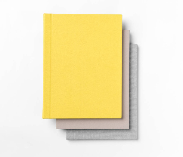 Pile hardcover books, isolated on white background. Top view - Photo, Image