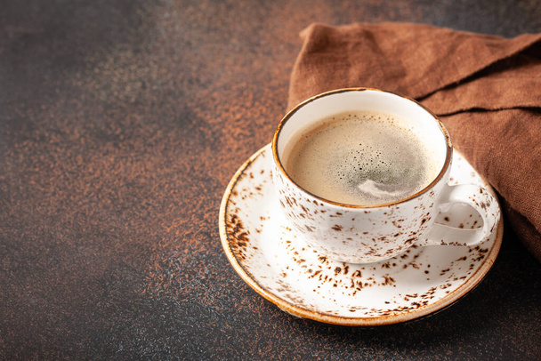Hot black coffee in vintage cup - Фото, зображення