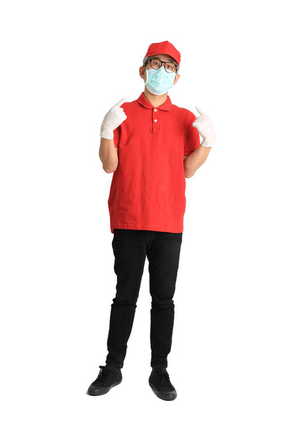 The senior Asian postman with face mask on the white background. - Foto, Imagem