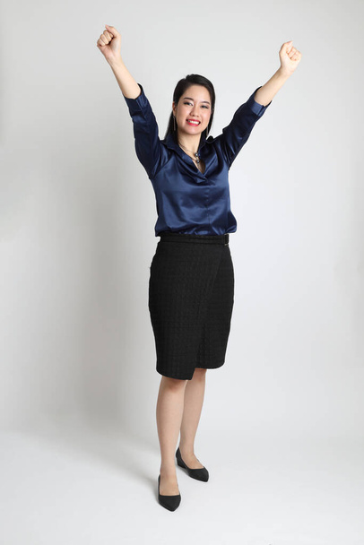 The Asian business woman standing on the white background. - Foto, Imagem