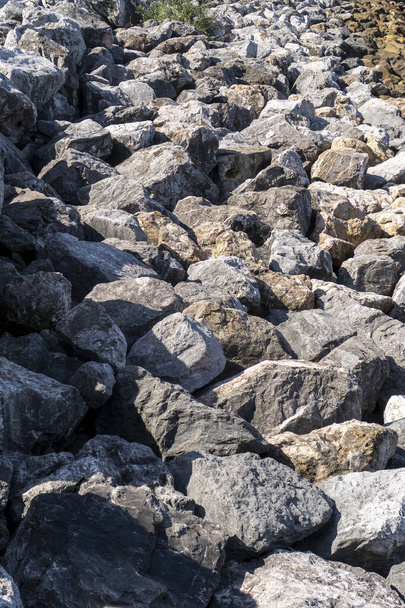 Hrubé hromady kamenů zblízka. Kamenitý povrch - Fotografie, Obrázek