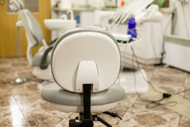 Closeup dentis workplace seat at the dentistry - Фото, изображение