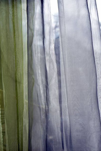 colored curtains on the window of the apartment - Foto, immagini