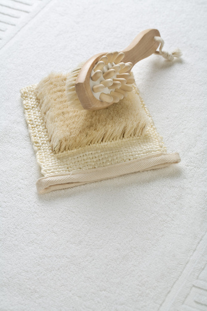 Massager and bast on towel - Foto, imagen