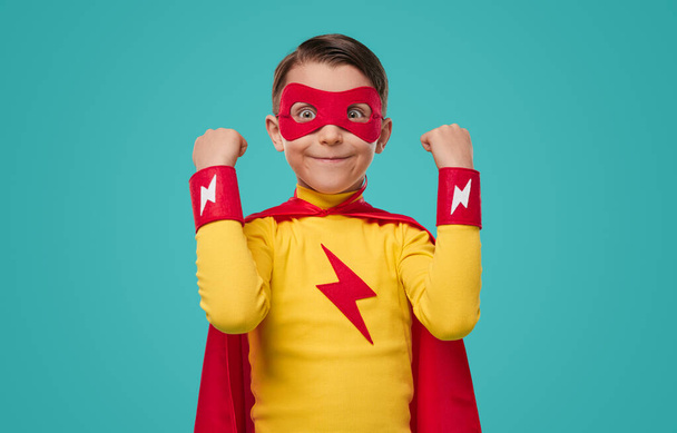 Excited superhero kid with funny face - Valokuva, kuva