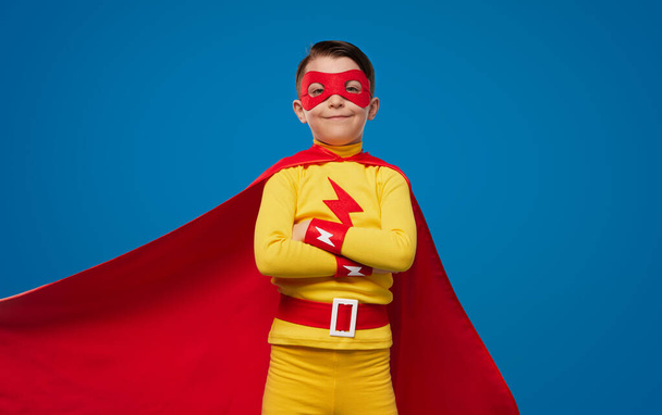 Confident kid in superhero costume and mask - Zdjęcie, obraz