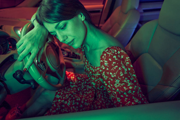Travel woman resting in car at night - Photo, Image