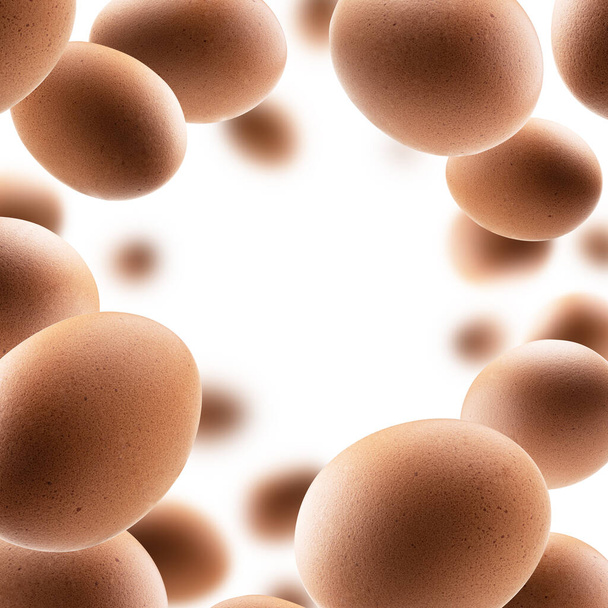 Brown chicken eggs levitate on a white background - Fotó, kép