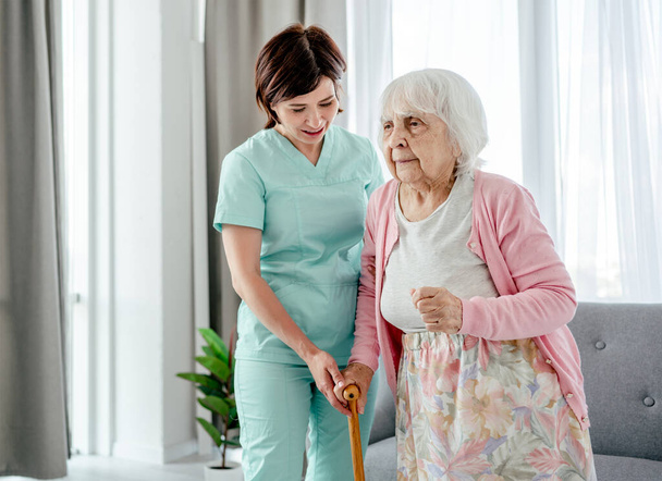Elderly woman and nurse - Fotó, kép