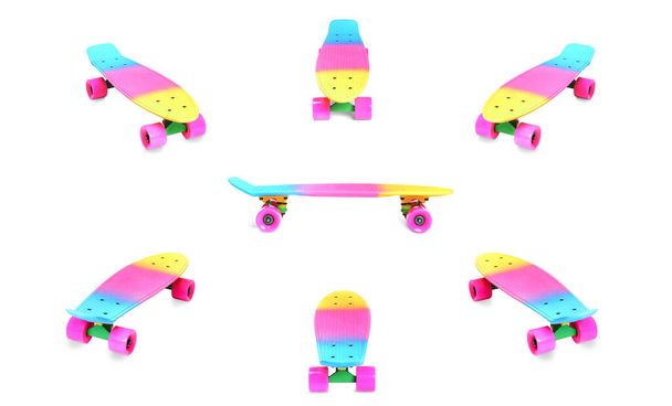 虹のセットプラスチックペニーボードスケートボード白に隔離された - 写真・画像
