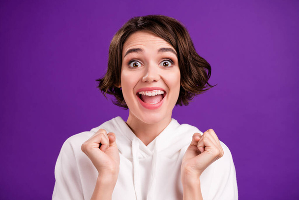 Photo portrait girl wearing hoody excited amazed smiling isolated bright pastel color background - Photo, image