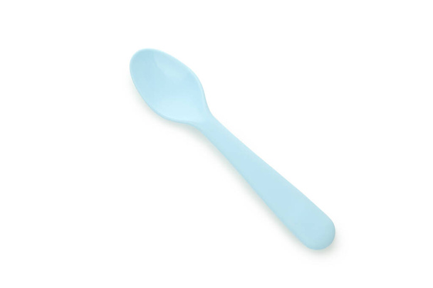 Singolo cucchiaio di plastica isolato su sfondo bianco - Foto, immagini